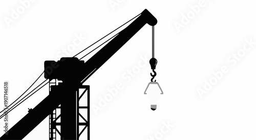 Silhouette of a heavy-duty crane lifting a glowing lightbulb against a bright white background.