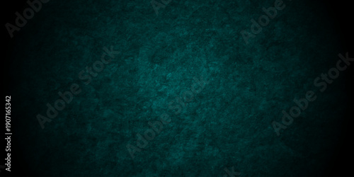 Dark green distressed cement concrete grunge wall granite slate texture background. 
