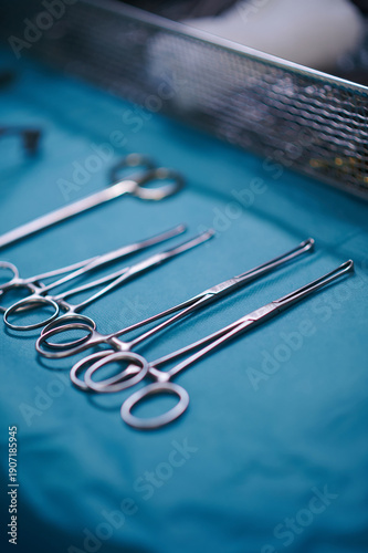 Variety of Surgical Forceps on Operating Table in Hospital
