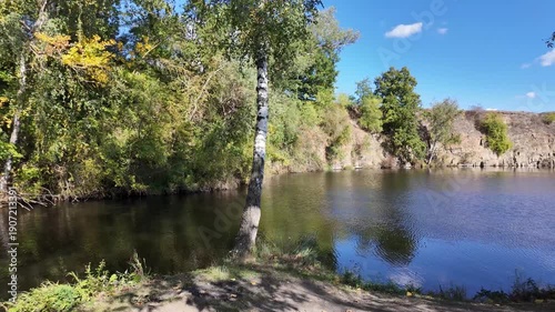 quarry lake landscape in autumn in Hundisburg, Saxony-Anhalt, Germany, landscape, slow motion pan, tranquility in beautiful nature