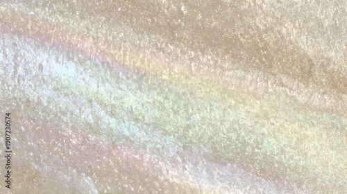 Iridescent pearl surface reflecting soft pastel rainbow spectrum, abstract background showing glossy texture and shimmering light effect