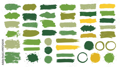 Green and yellow brush strokes and splatters on white background