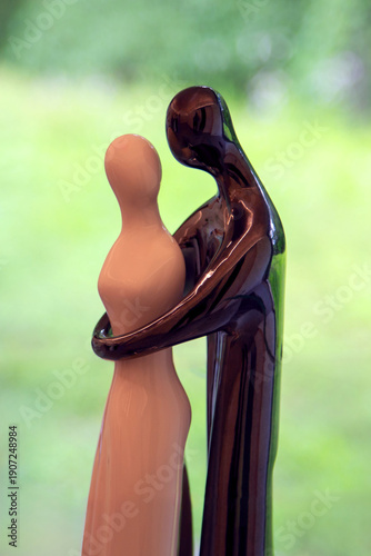 Porcelain love sculpture of a woman and a man