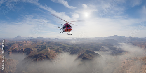 Wallpaper Mural Red Helicopter Soaring Over Mountain Range Under a Clear Sky in Morning Aerial View Torontodigital.ca