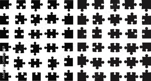 Multitude of black jigsaw puzzle pieces are arranged in a uniform grid pattern across the entire frame.