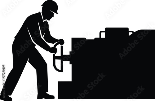 Worker operating heavy machinery in industrial setting