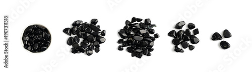 Φωτογραφία Black onyx pebbles isolated, polished hematite gem stones