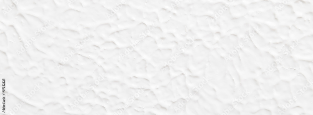Fototapeta premium White textured wall abstract background with rough plaster surface for design and photography