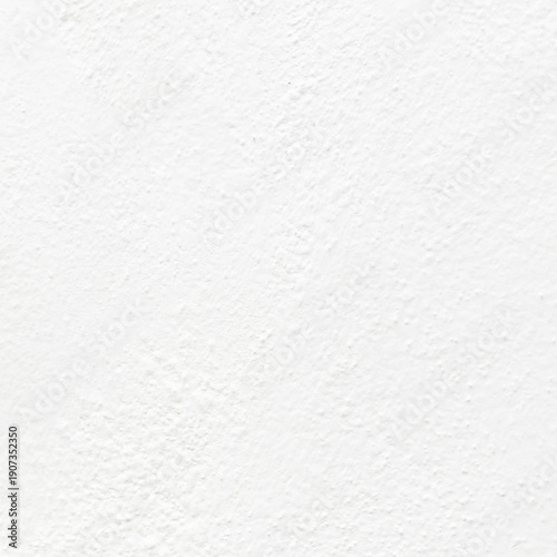 Chalky white textured wall background for design projects, clean backdrop, and minimal visual context
