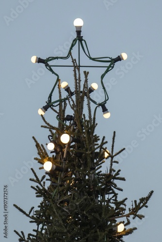 Christmas tree illuminated with light bulbs with star tip, Korpoström, Korpo or Korppo, southwestern archipelago, Finland
