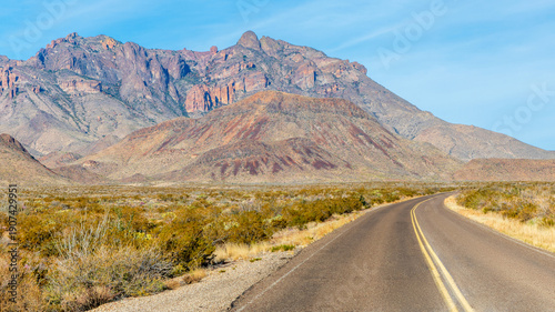An asphalt road running through the Chihuahuan Desert in Big Bend National Park