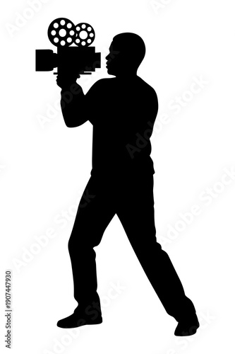 Silhouette of filmmaker operating vintage movie camera recording action sequence