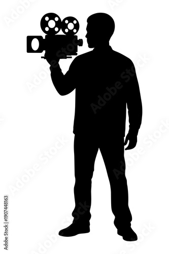 Silhouette of a professional filmmaker operating a vintage movie camera device