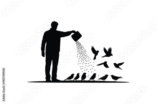 Silhouette of a person feeding birds with seeds from a container in black and white