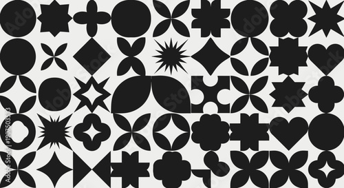 A collection of abstract geometric shapes in black and white, forming a repeating pattern.