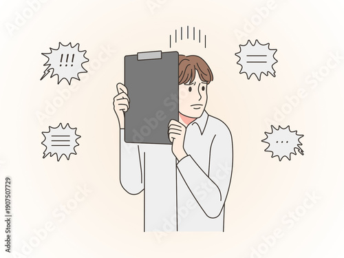 Фотография Anxious Employee Hiding Behind Clipboard from Criticism
