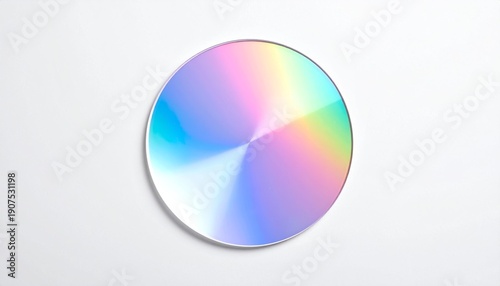Circular object with iridescent surface reflecting multiple colors against a white background