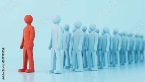 Orange figure leading line of blue figures symbolizing leadership, individuality, teamwork and standing out from crowd with subtle motivational tone