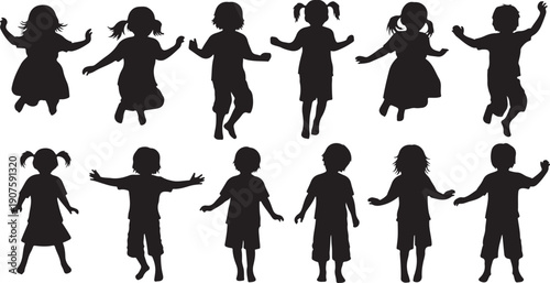 Silhouettes of happy children jumping and playing together outside