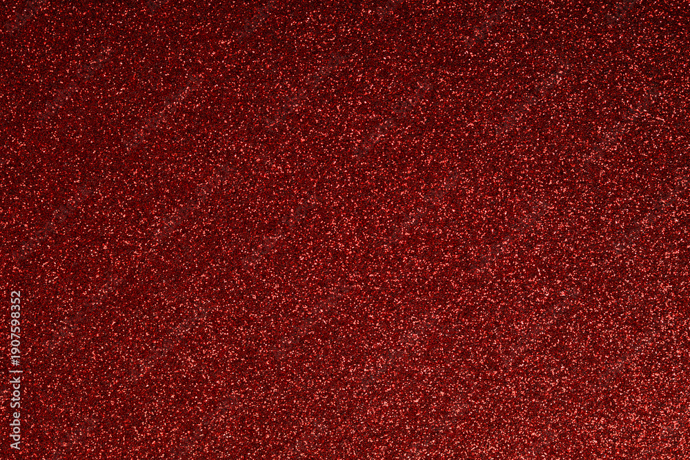 Fototapeta premium Abstract red glitter background texture. Perfect for Christmas, Valentine's Day, New Year, holiday, celebration, and lux