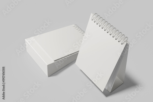 Two Spiral Bound Desk Calendars with White Pages Blue Text
