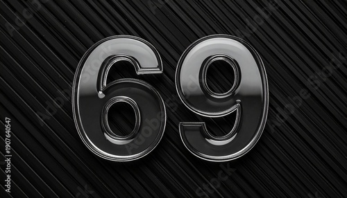 Number 69 in solid glass, black surface, bold highlights, and fine diagonal line pattern.