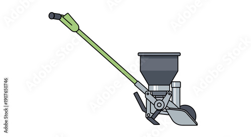 Seeder machine with long green handle being used in a garden from a high angle viewpoint
