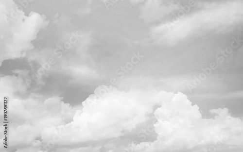 Threatening white clouds covering the gray sky 