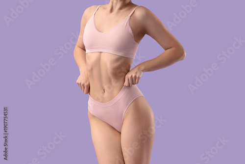 Young woman in underwear on...