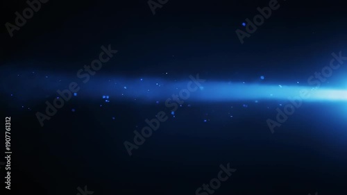Abstract, vibrant blue light with bokeh effect and a dark background