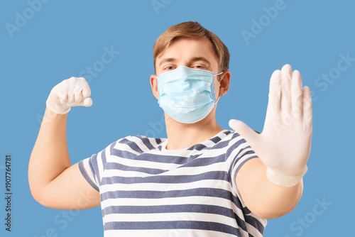 Young man in medical mask s...