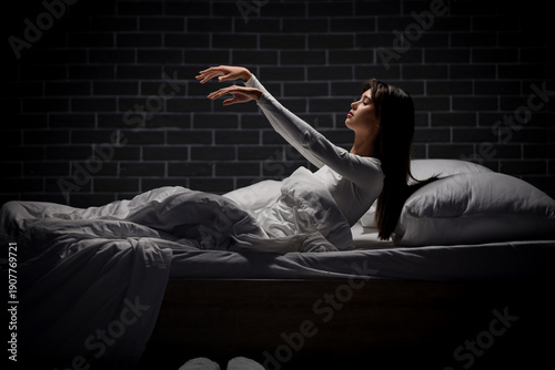 Female sleepwalker sitting ...