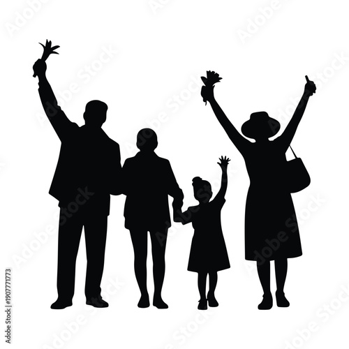 Happy family celebrating together with raised arms in joyful moment
