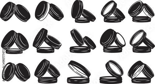 Black and white macarons in various stacked positions illustration