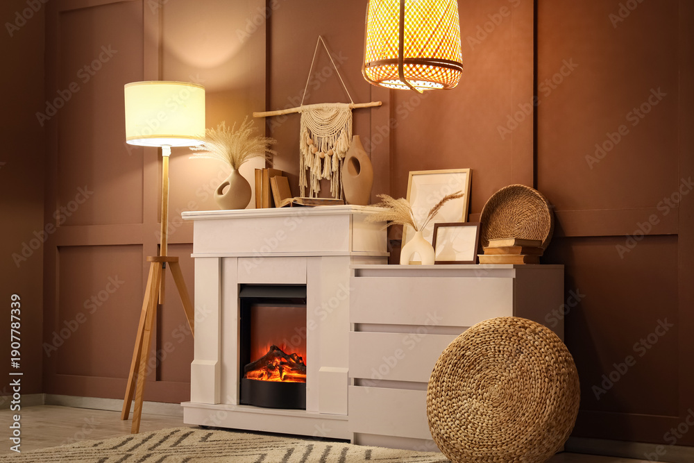 Naklejka premium Interior of cozy room with glowing lamps, dresser and stylish fireplace