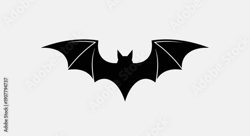 Black silhouette of a bat with wings spread wide.