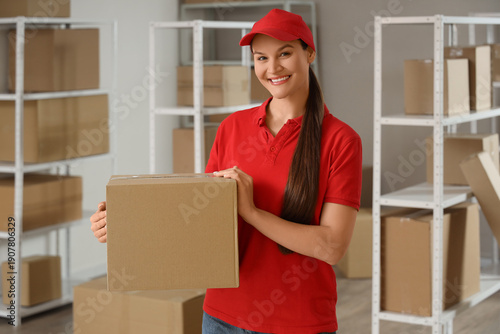 Female worker with parcel b...
