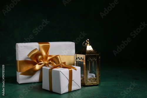 Fanoos and gift boxes on gr...