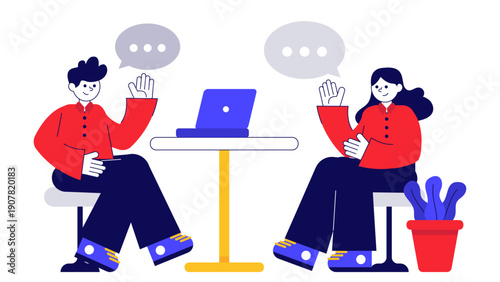 Two colleagues having a productive discussion with a laptop during a professional consulting session