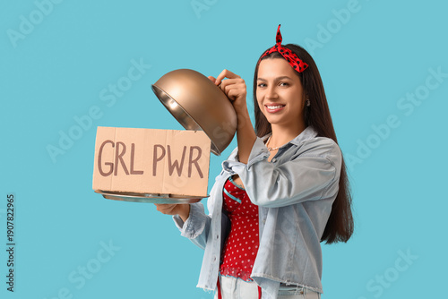 Young pin-up woman holding ...