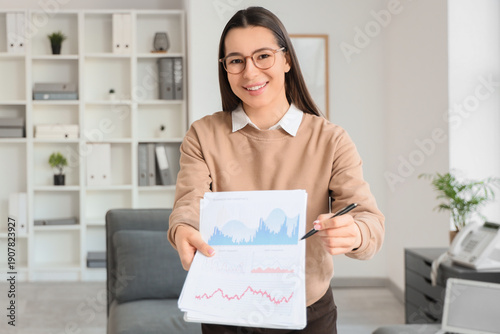 Happy businesswoman with re...