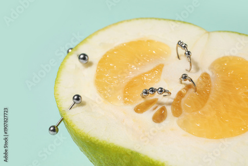Half of citrus fruit with p...