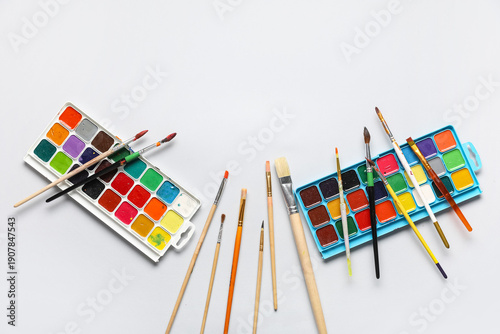 Artist brushes and paints o...