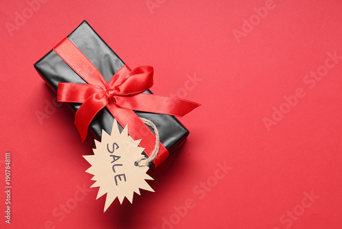 Gift box with ribbon and la...