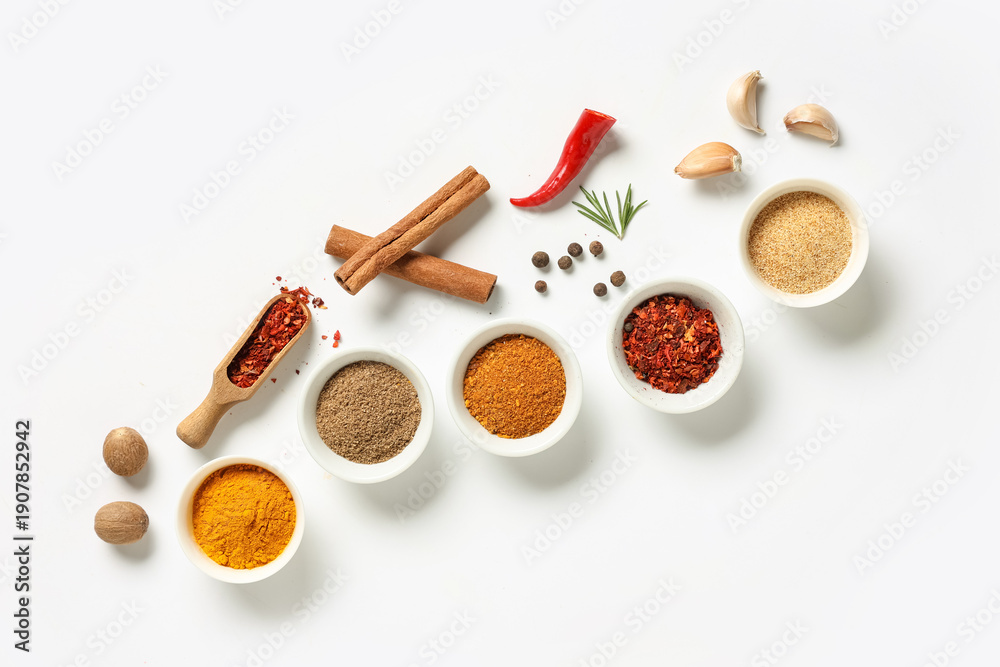 Obraz premium Composition with bowls of different fresh spices on light background