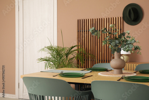 Stylish table setting in di...