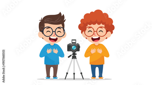 Two cheerful young boys wearing glasses laughing and having fun while using a professional camera on a tripod.