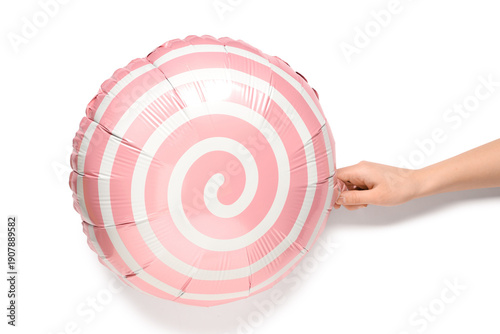 Female hand with balloon is...