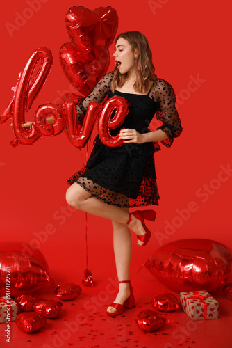 Surprised young woman with ...