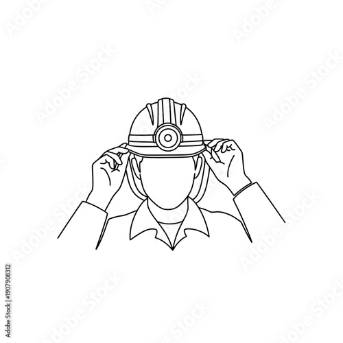 Front view of miner adjusting protective hard hat with lamp